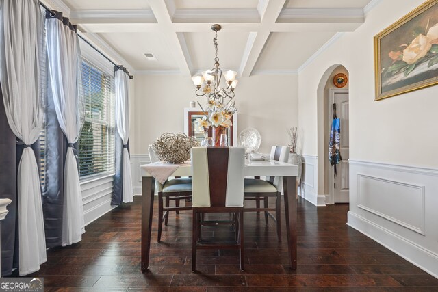 2441 Noelle Ln, Powder Springs, GA 30127 - dining space featuring a chandelier, beamed ceiling, dark wood finished floors, and arched walkways