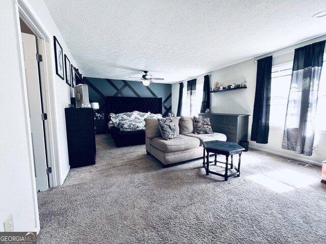 4436 Old Country Way, Snellville, GA 30039 - carpeted bedroom featuring a textured ceiling, multiple windows, and a ceiling fan