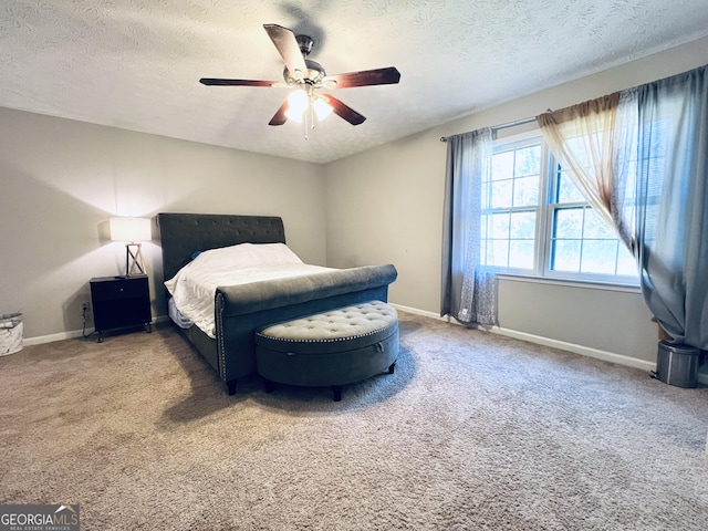 4436 Old Country Way, Snellville, GA 30039 - carpeted bedroom with a textured ceiling and a ceiling fan