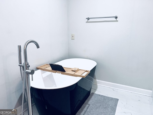 4436 Old Country Way, Snellville, GA 30039 - bathroom featuring marble finish flooring and a freestanding bath