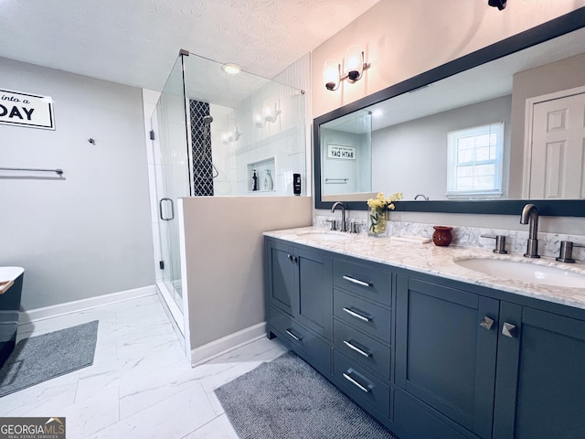 4436 Old Country Way, Snellville, GA 30039 - bathroom with a stall shower, marble look tile flooring, double vanity, a freestanding bath, and a textured ceiling