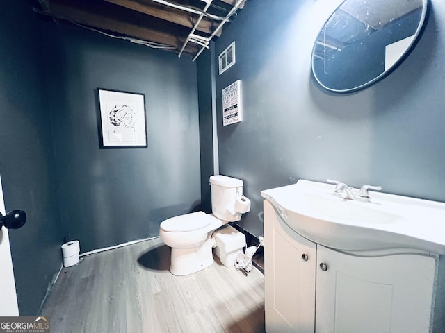 4436 Old Country Way, Snellville, GA 30039 - half bathroom featuring vanity and wood finished floors