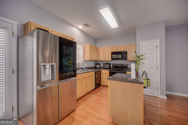 5381 Briar Creek Ln, Norcross, GA 30071 - kitchen with black appliances, light brown cabinets, a sink, a kitchen island, and light wood-style floors