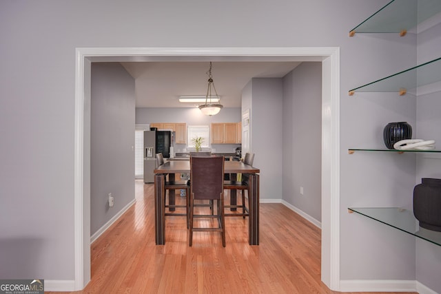 5381 Briar Creek Ln, Norcross, GA 30071 - dining room with light wood-type flooring and baseboards
