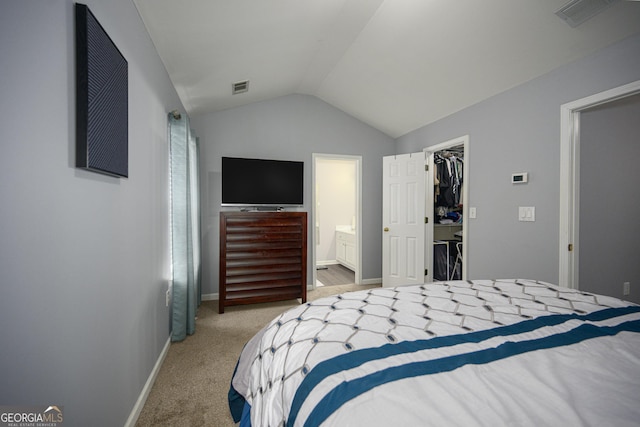5381 Briar Creek Ln, Norcross, GA 30071 - bedroom with lofted ceiling, carpet flooring, a walk in closet, baseboards, and ensuite bathroom