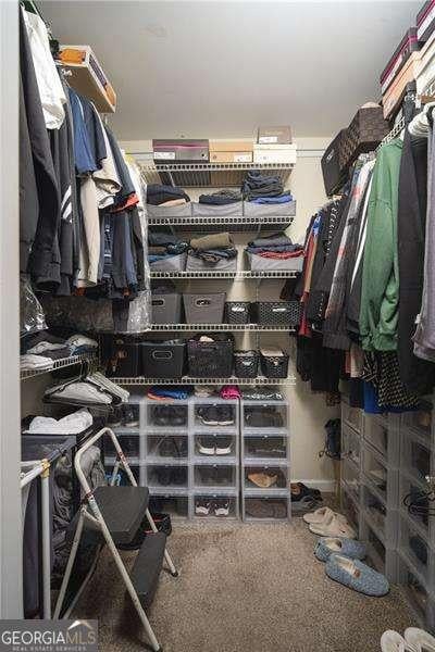 5381 Briar Creek Ln, Norcross, GA 30071 - walk in closet with carpet floors