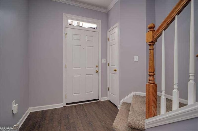 5381 Briar Creek Ln, Norcross, GA 30071 - entrance foyer featuring crown molding, dark wood-style floors, baseboards, and stairs