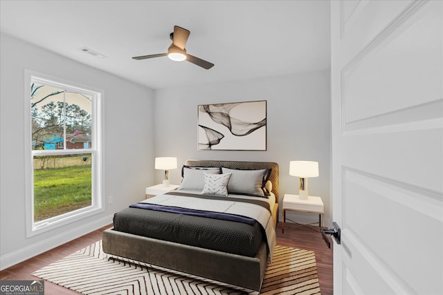 149 Irwin St, Cedartown, GA 30125 - bedroom with wood finished floors, ceiling fan, and baseboards