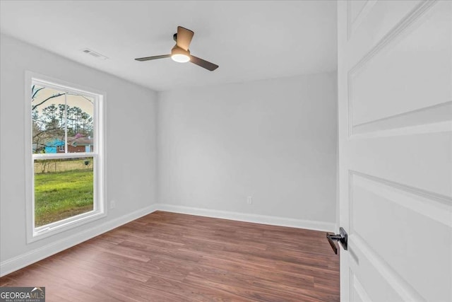 149 Irwin St, Cedartown, GA 30125 - spare room with wood finished floors, baseboards, and a ceiling fan
