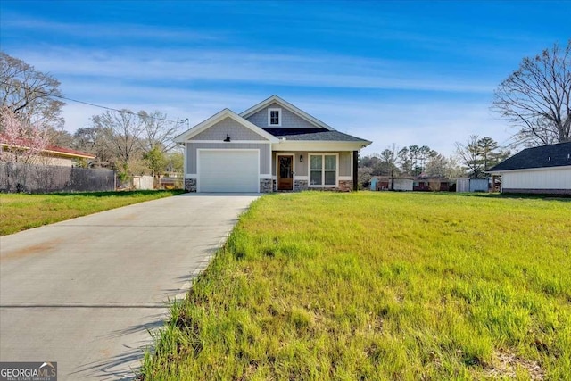 149 Irwin St, Cedartown, GA 30125 - craftsman house featuring stone siding, driveway, and an attached garage