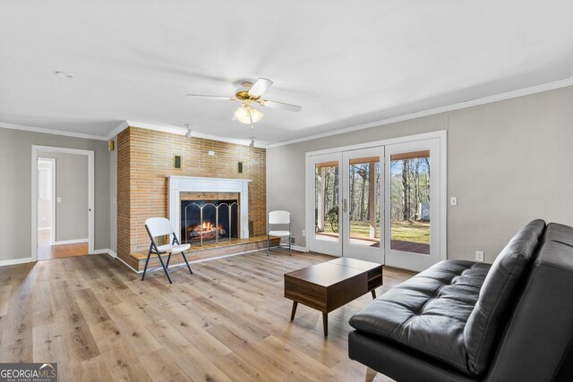 3920 Blue Ridge Dr, Blue Ridge, GA 30513 - living room with light wood finished floors, baseboards, crown molding, and ceiling fan