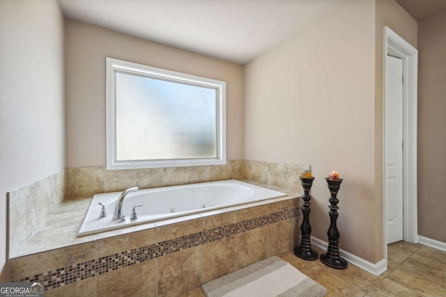 full bathroom with a whirlpool tub and tile patterned flooring