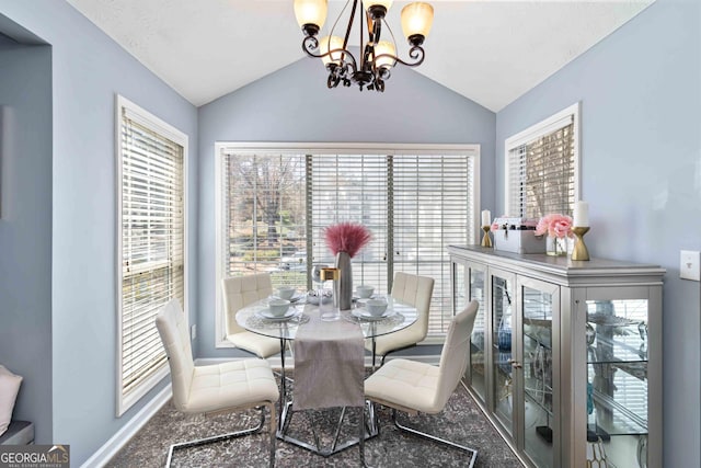 909 Glenleaf Dr, Peachtree Corners, GA 30092 - dining space featuring a chandelier, vaulted ceiling, plenty of natural light, and baseboards