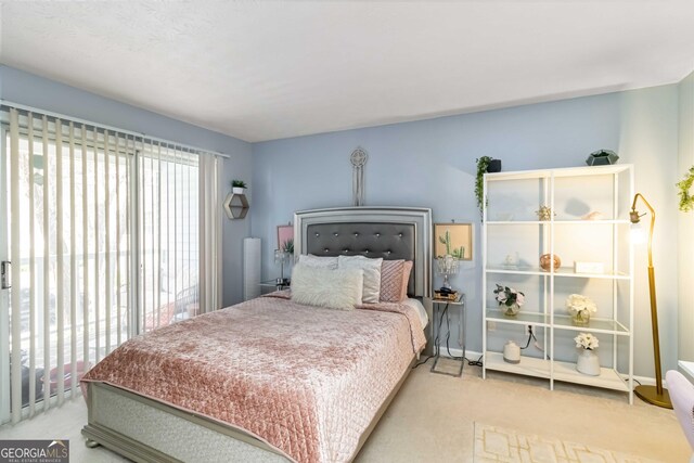 909 Glenleaf Dr, Peachtree Corners, GA 30092 - carpeted bedroom with baseboards