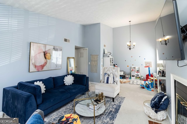 909 Glenleaf Dr, Peachtree Corners, GA 30092 - carpeted living area with a chandelier and high vaulted ceiling