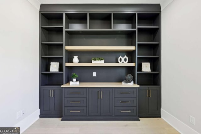 3057 Bold Springs Rd, Dacula, GA 30019 - detailed view of baseboards and wood finished floors