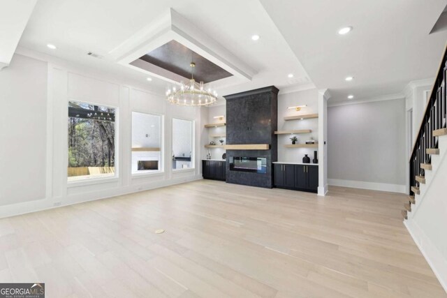 3057 Bold Springs Rd, Dacula, GA 30019 - unfurnished living room with baseboards, a chandelier, stairs, recessed lighting, and light wood-style floors
