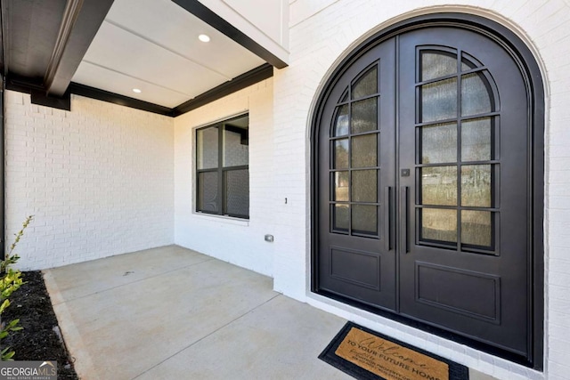3057 Bold Springs Rd, Dacula, GA 30019 - view of exterior entry with french doors and brick siding