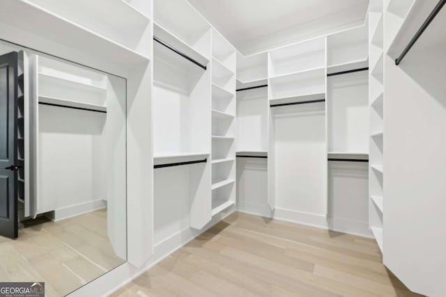 3057 Bold Springs Rd, Dacula, GA 30019 - walk in closet featuring light wood-type flooring