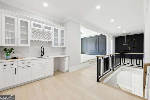 3057 Bold Springs Rd, Dacula, GA 30019 - interior space featuring a sink, wet bar, light wood-style floors, and recessed lighting