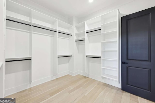 3057 Bold Springs Rd, Dacula, GA 30019 - spacious closet with light wood-style flooring