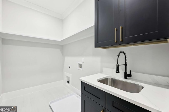 3057 Bold Springs Rd, Dacula, GA 30019 - clothes washing area with a sink, cabinet space, baseboards, hookup for an electric dryer, and hookup for a washing machine