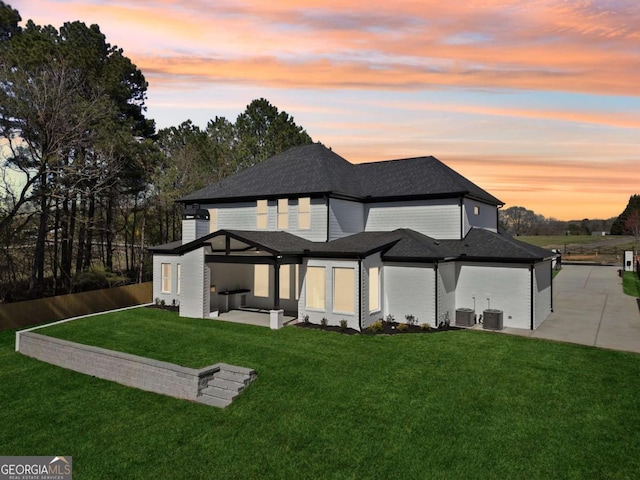 3057 Bold Springs Rd, Dacula, GA 30019 - back of property with a yard, a patio area, roof with shingles, and an outdoor living space