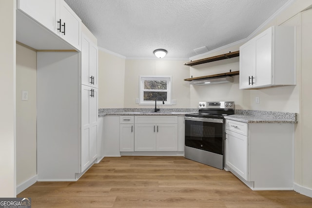 kitchen with white cabinetry, stainless steel electric range, light wood-type flooring, and a sink