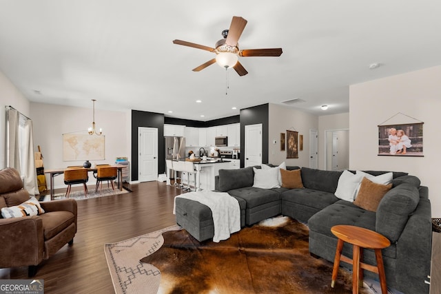 149 Pleasantdale Dr, Demorest, GA 30535 - living area featuring ceiling fan, dark wood finished floors, and a chandelier