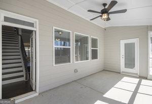 view of patio featuring ceiling fan