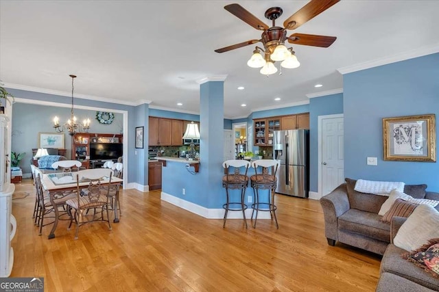 16 Quarter Horse Dr NW, Rome, GA 30165 - living room with baseboards, recessed lighting, light wood-style floors, ceiling fan with notable chandelier, and ornamental molding