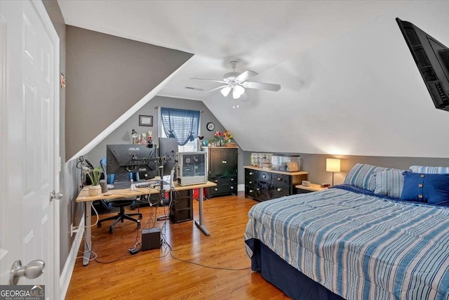 16 Quarter Horse Dr NW, Rome, GA 30165 - bedroom with wood finished floors, a ceiling fan, and lofted ceiling