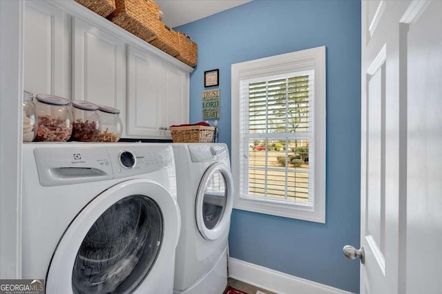 16 Quarter Horse Dr NW, Rome, GA 30165 - laundry area featuring washing machine and clothes dryer, cabinet space, and baseboards