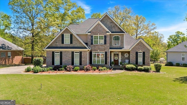 16 Quarter Horse Dr NW, Rome, GA 30165 - craftsman house with a front lawn and brick siding