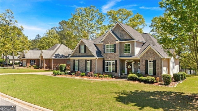 16 Quarter Horse Dr NW, Rome, GA 30165 - craftsman-style home with a front lawn and brick siding