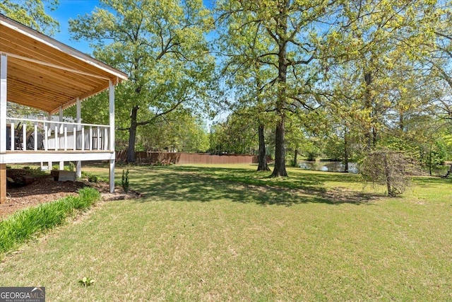 16 Quarter Horse Dr NW, Rome, GA 30165 - view of yard featuring a deck with water view and fence