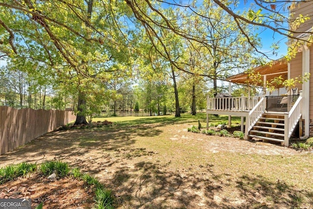 16 Quarter Horse Dr NW, Rome, GA 30165 - view of yard featuring a wooden deck, stairway, and fence