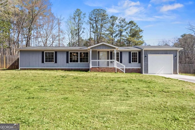 1833 Lost Mountain Rd, Powder Springs, GA 30127 - ranch-style home with a front lawn, an attached garage, fence, and driveway