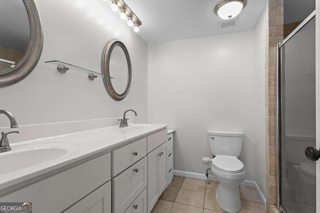 1833 Lost Mountain Rd, Powder Springs, GA 30127 - full bath with tile patterned flooring, tiled shower, toilet, and a sink