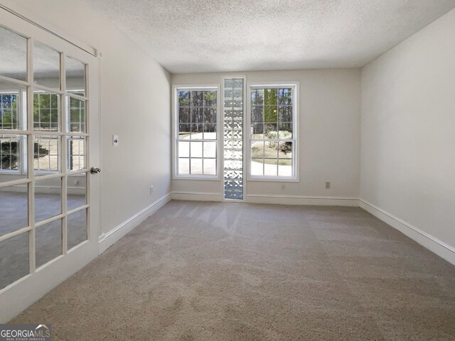 105 Creekwood Ln, Fayetteville, GA 30214 - carpeted spare room featuring baseboards and a textured ceiling