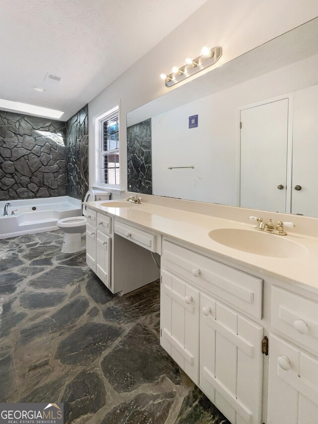 105 Creekwood Ln, Fayetteville, GA 30214 - full bath with toilet, double vanity, a bathing tub, marble finish floor, and a sink