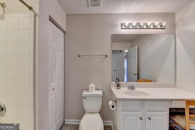 bathroom featuring a closet, visible vents, a textured ceiling, and toilet