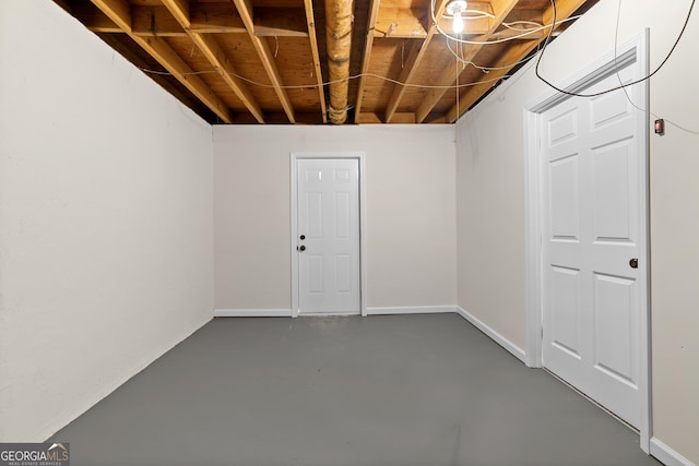 unfinished basement with baseboards