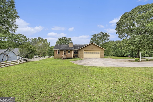 traditional-style house featuring fence, driveway, a chimney, and a front yard