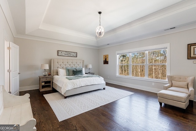 bedroom with visible vents, baseboards, a raised ceiling, a notable chandelier, and dark wood-style flooring