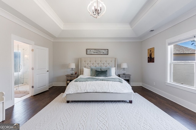 bedroom featuring a raised ceiling, wood finished floors, an inviting chandelier, and multiple windows