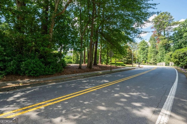 59 Woodlawn Dr, Marietta, GA 30067 - view of road featuring traffic signs and sidewalks