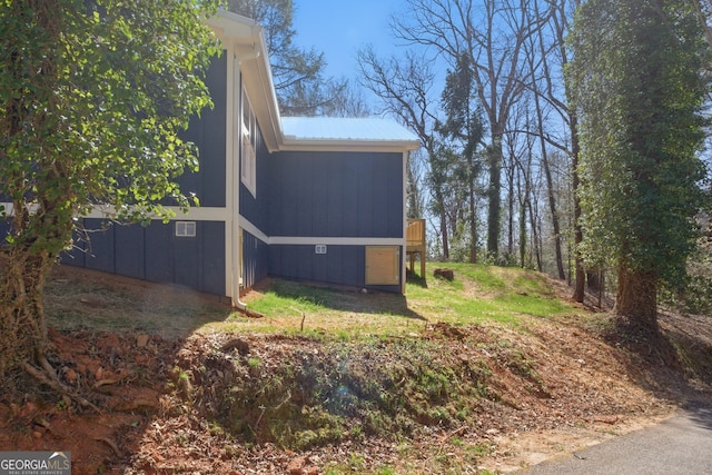 view of home's exterior featuring metal roof