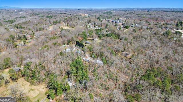 bird's eye view featuring a view of trees