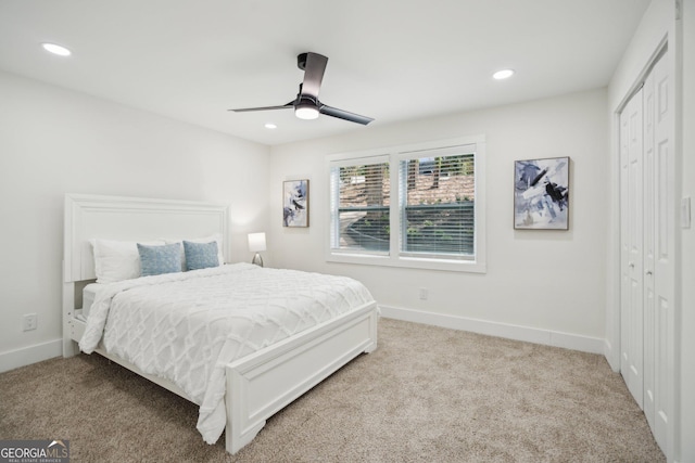 7410 Fields Dr, Cumming, GA 30041 - bedroom with a closet, recessed lighting, light colored carpet, and baseboards